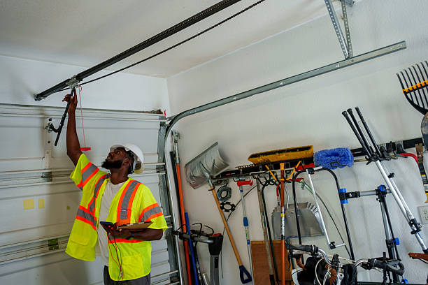 Professional Garage Door Panel Replacement technician working in Quincy, IL